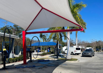 Car wash vacuums with canopies